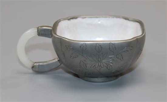 A Chinese Yixing glazed pottery and pewter cup, jade handle